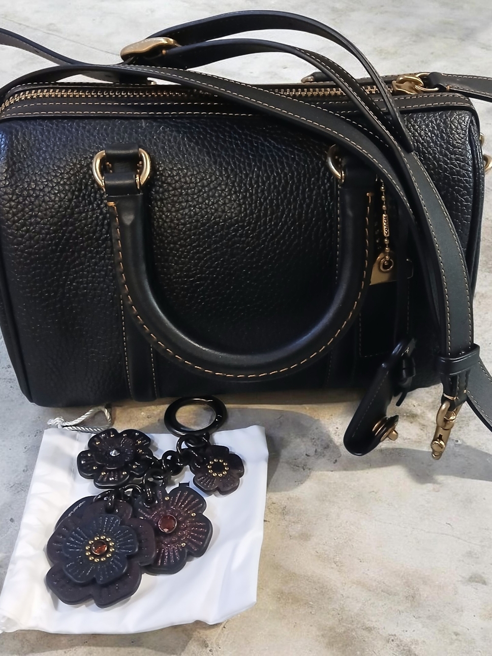 Black Leather Satchel Handbag with Floral Charm
